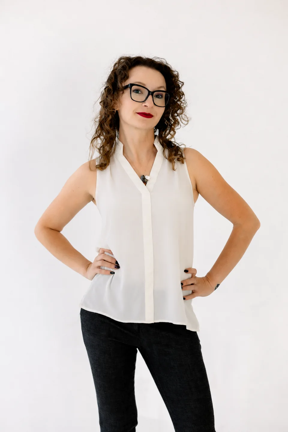 Lindsey Yagi-Hatake standing with hands on hips.